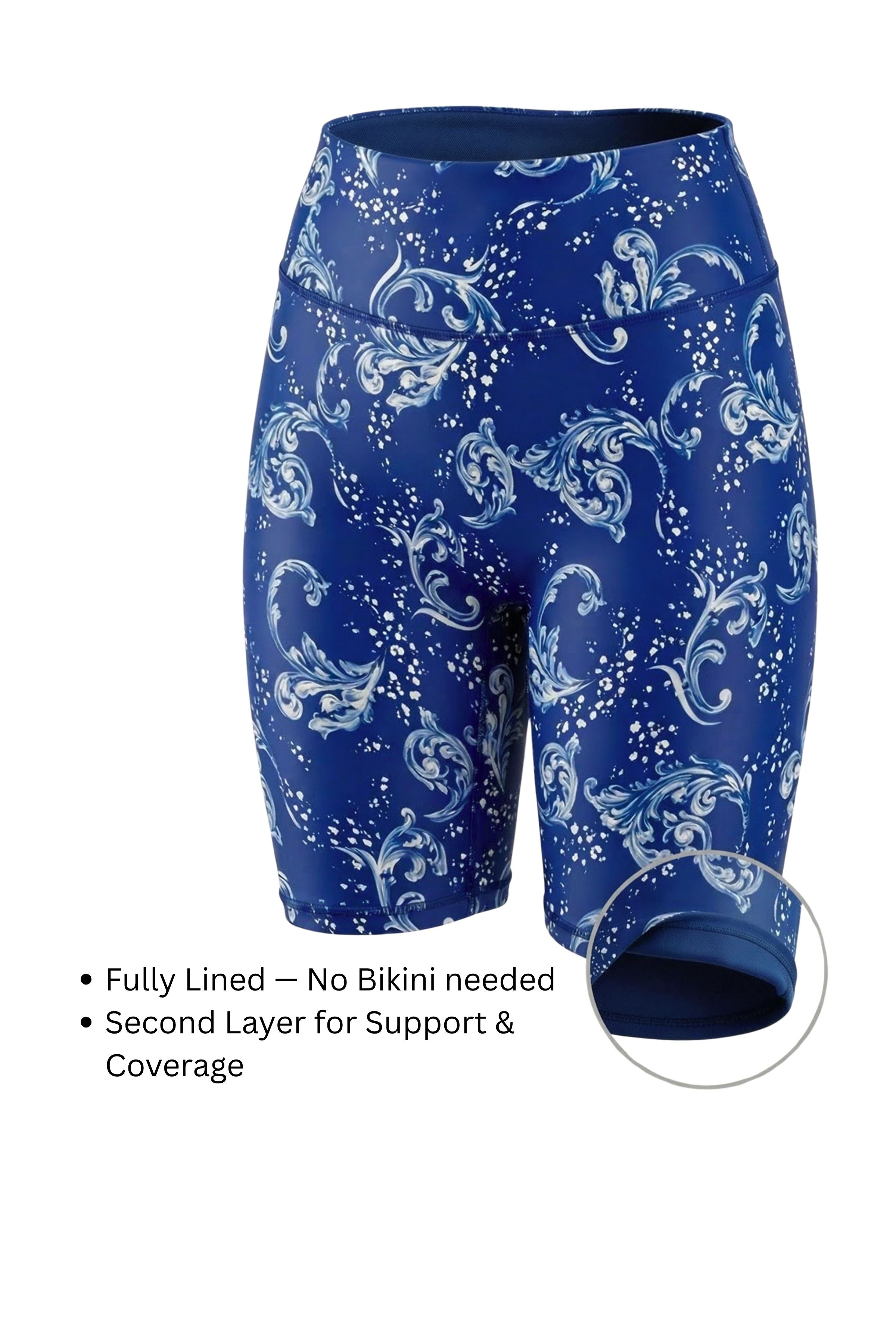 Blue athletic shorts with white patterns on a white background