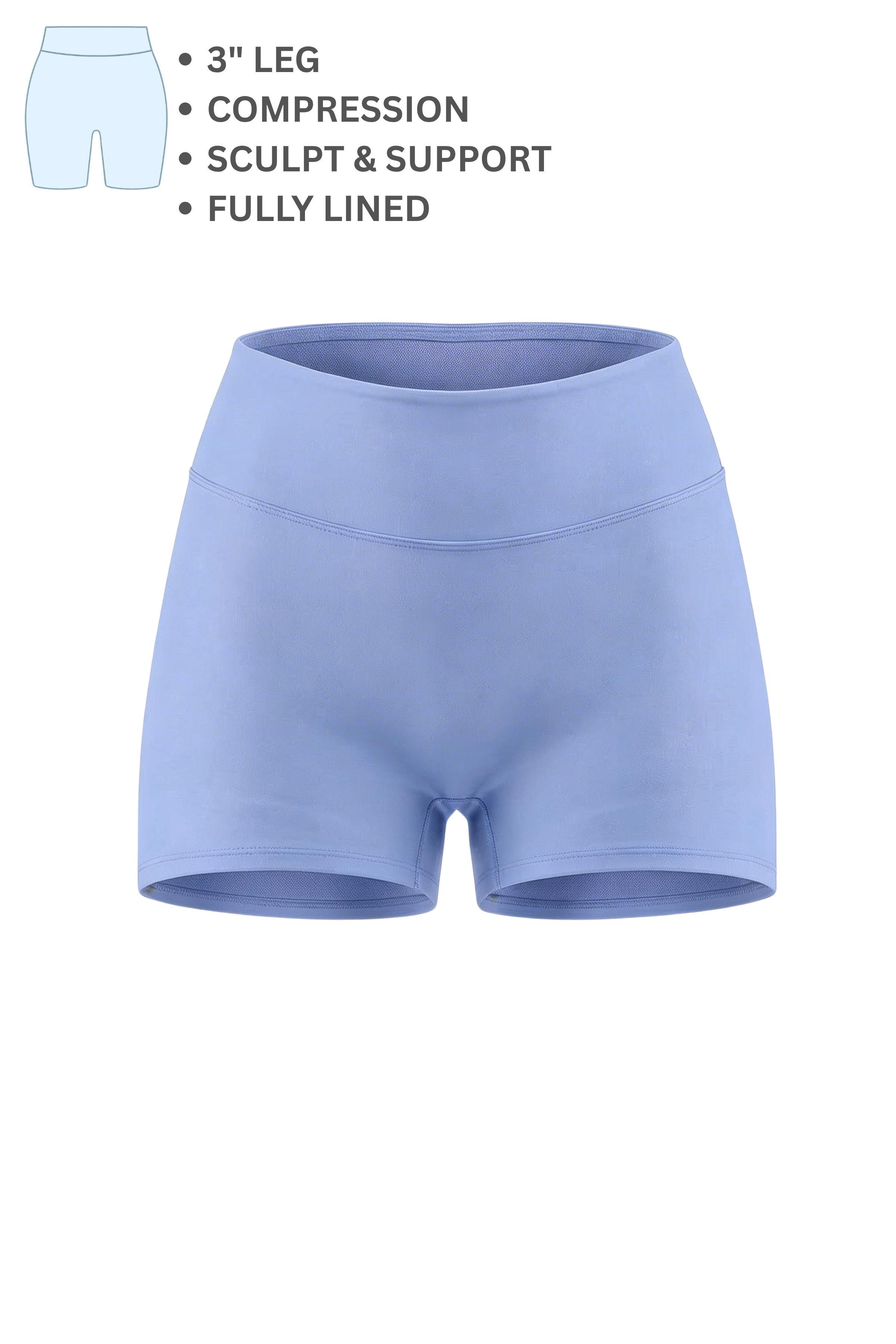 Blue compression shorts with text highlighting features on a white background