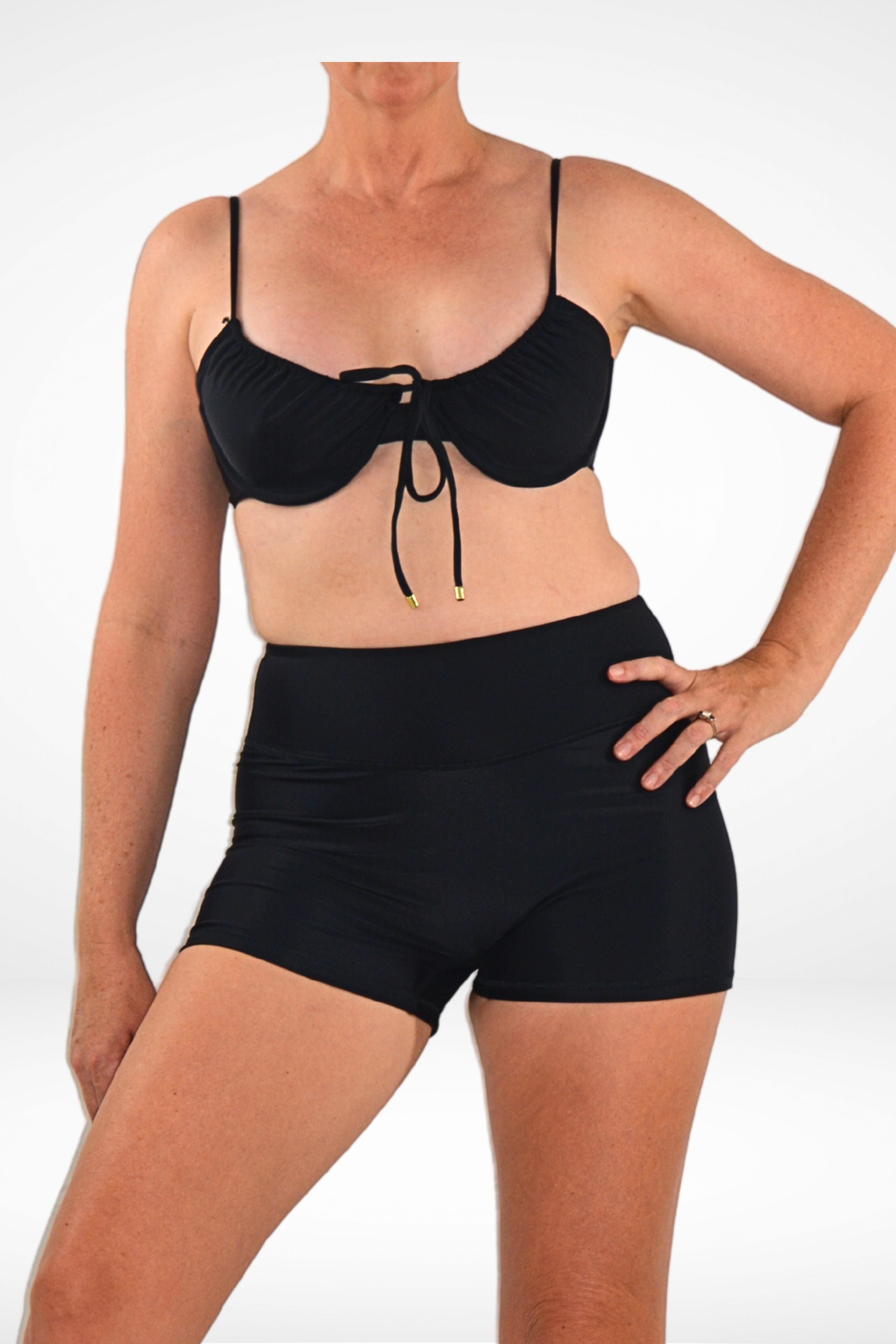 women wearing andavi black underwire bikini top and swim shorts bundle