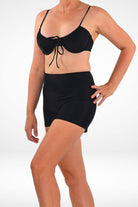 women wearing andavi black underwire bikini top and swim shorts bundle