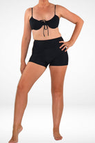 women wearing andavi black underwire bikini top and swim shorts bundle