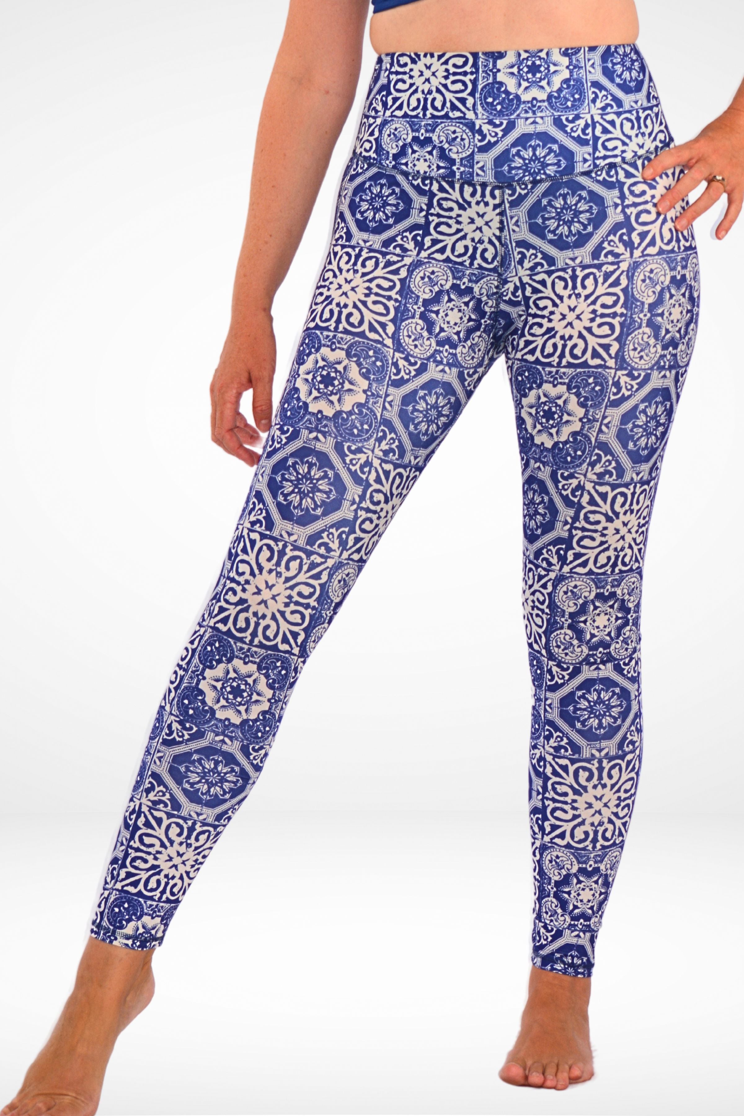 women wearing andavi white and blue tile print swim leggings