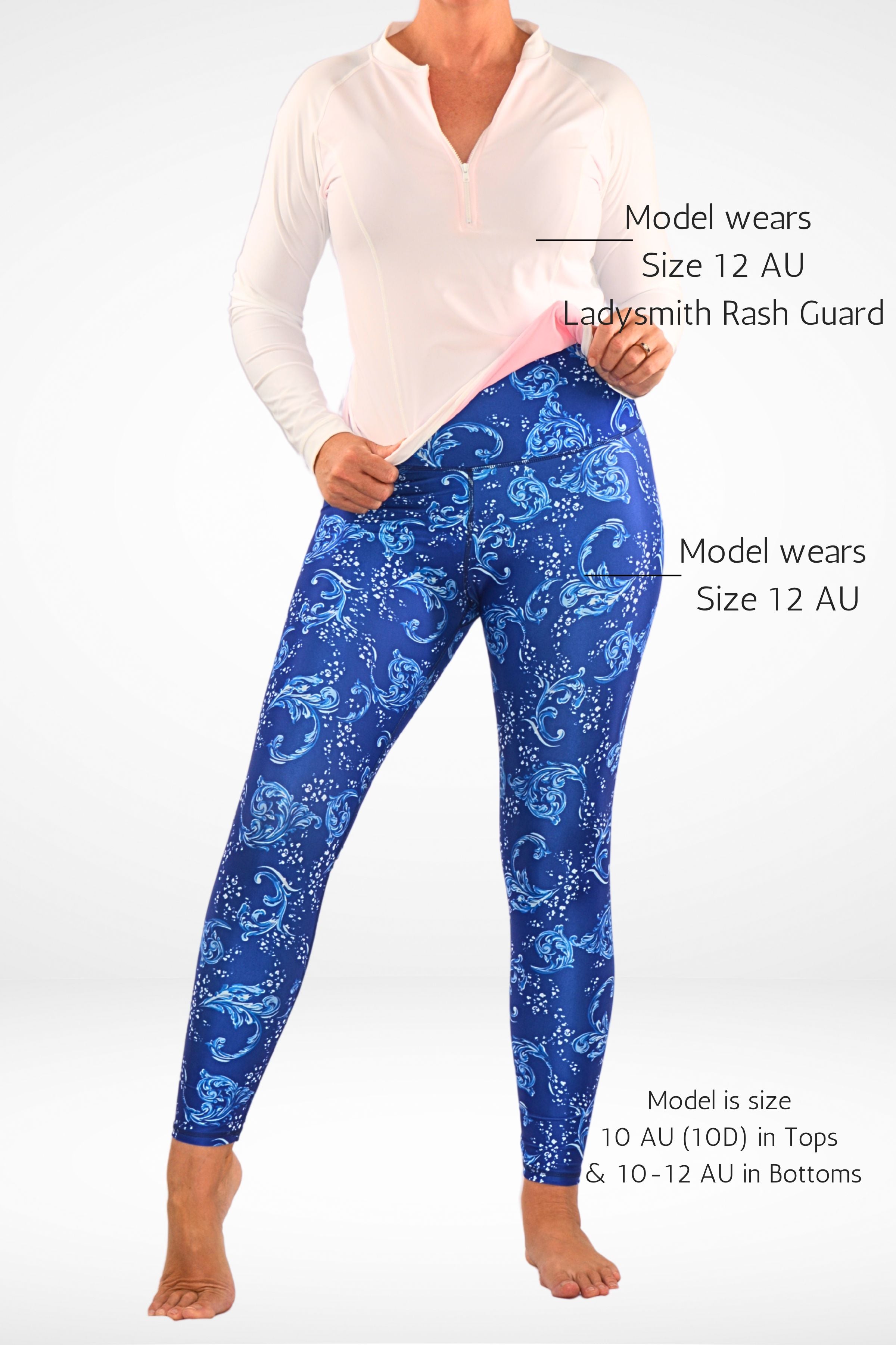 women wearing andavi swim blue and white print swim legging and white and pink long sleeve rash guard