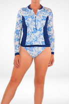 women wearing andavi navy blue and white long sleeve rash guard bikini set