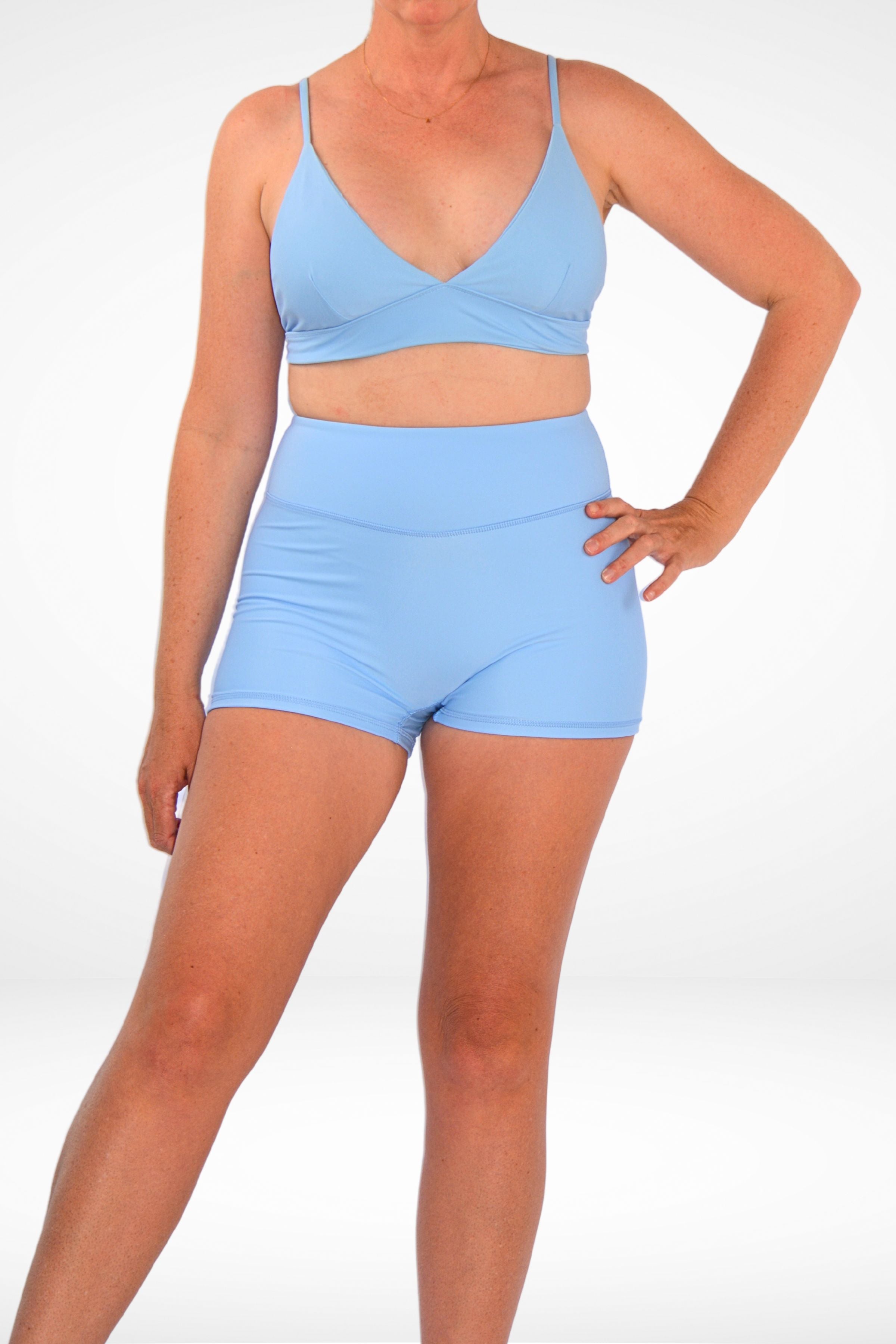 wearing andavi light blue bikini top and matching light blue swim shorts