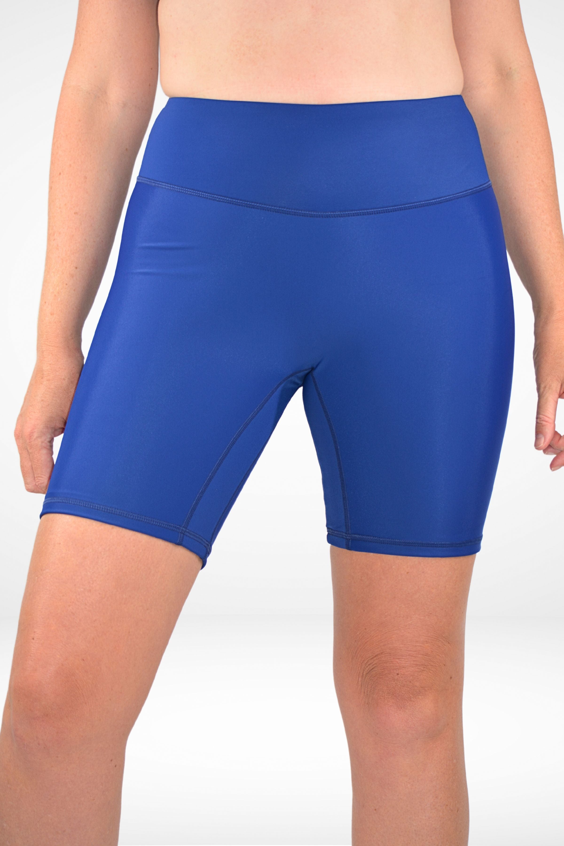 model wearing andavi swim navy blue long line swim shorts