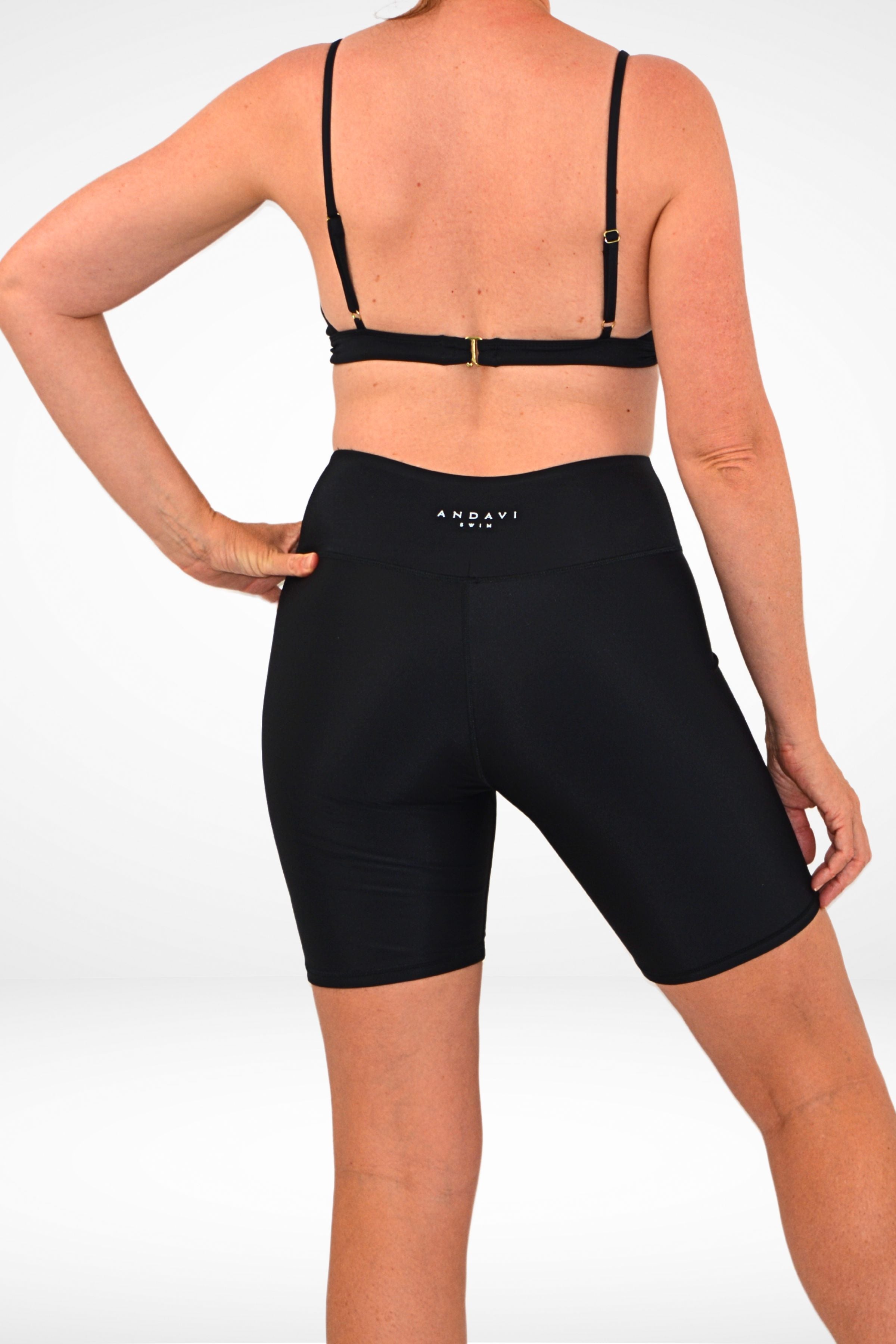 model wearing andavi swim active long line bike shorts in black