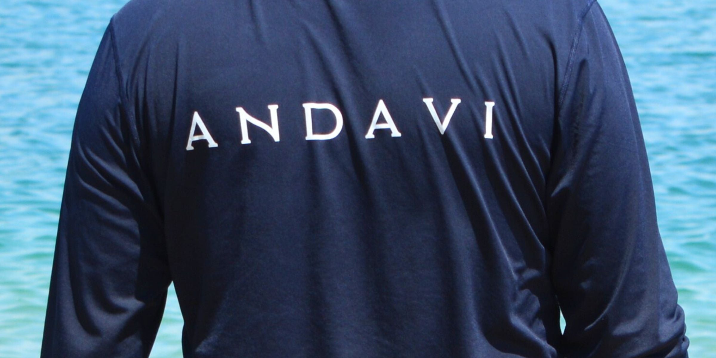 man wearing andavi mens rash guard with long sleeve in navy blue
