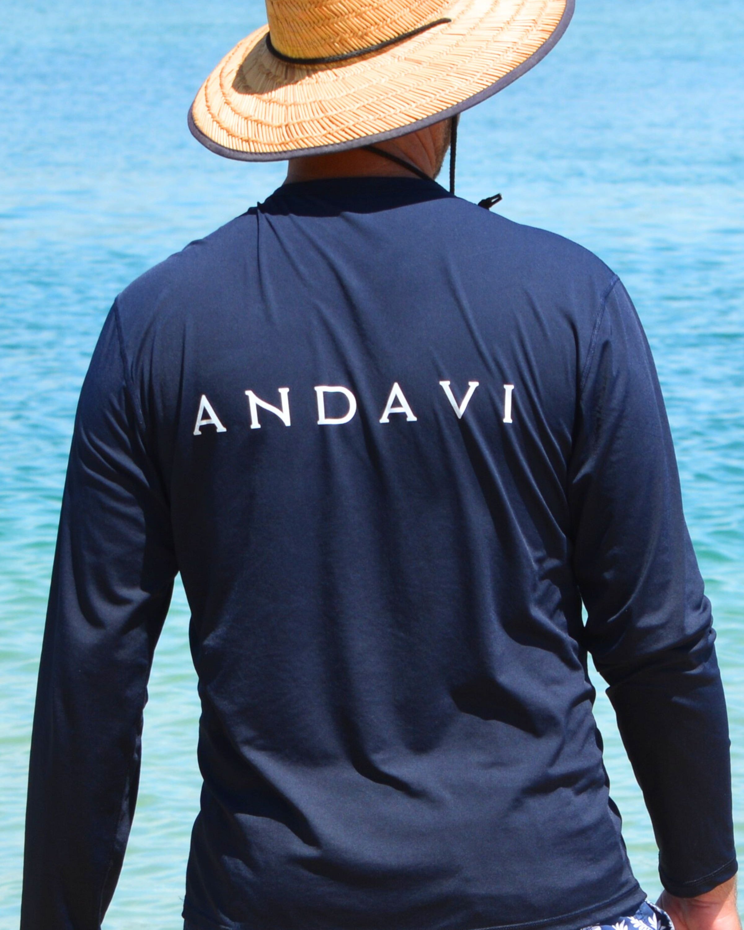 man wearing andavi mens rash guard with long sleeve in navy blue