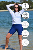 model wearing andavi swim navy blue long line swim shorts