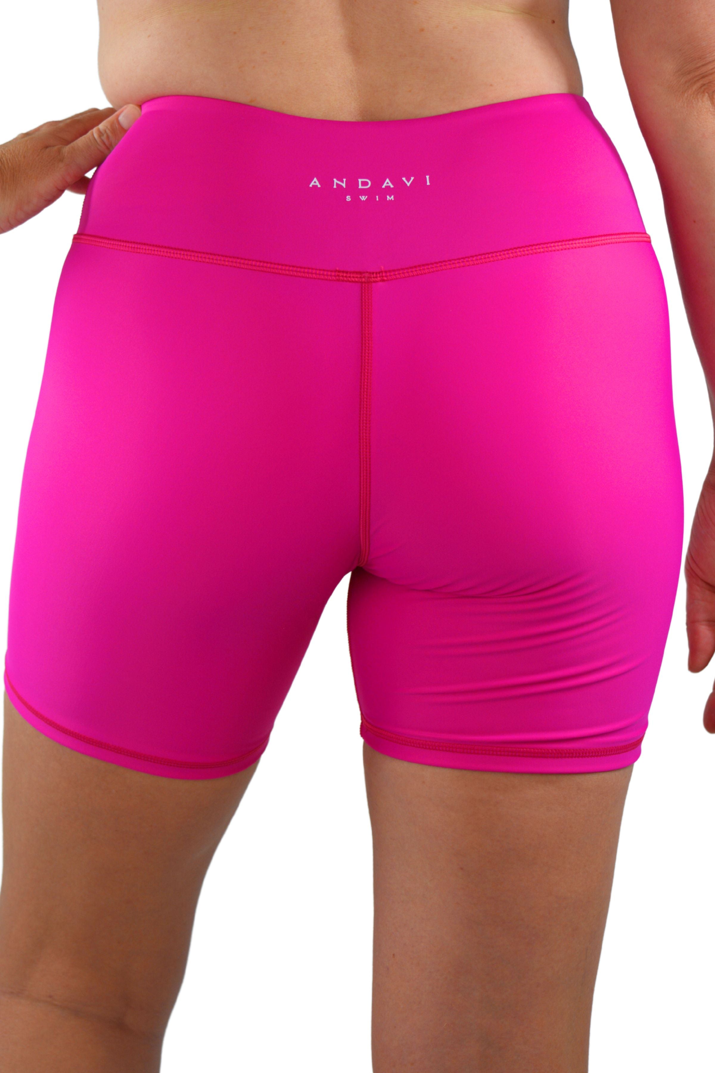 model wearing andavi swim hot pink swim shorts