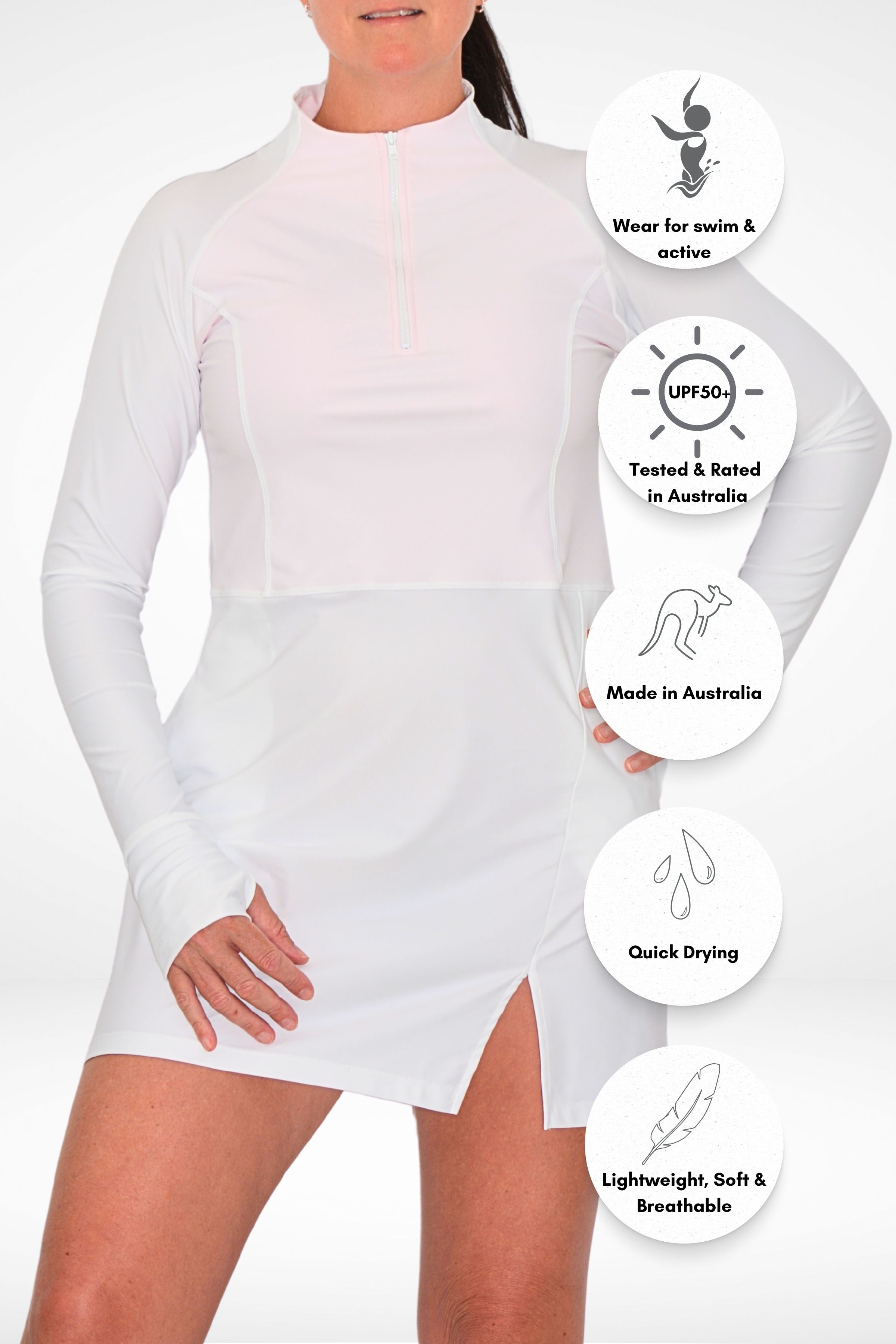 model wearing andavi white pink swim active sun protections upf50+ dress cover up with front zip and high neck collar