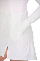 model wearing andavi white pink swim active sun protections upf50+ dress cover up with front zip and high neck collar
