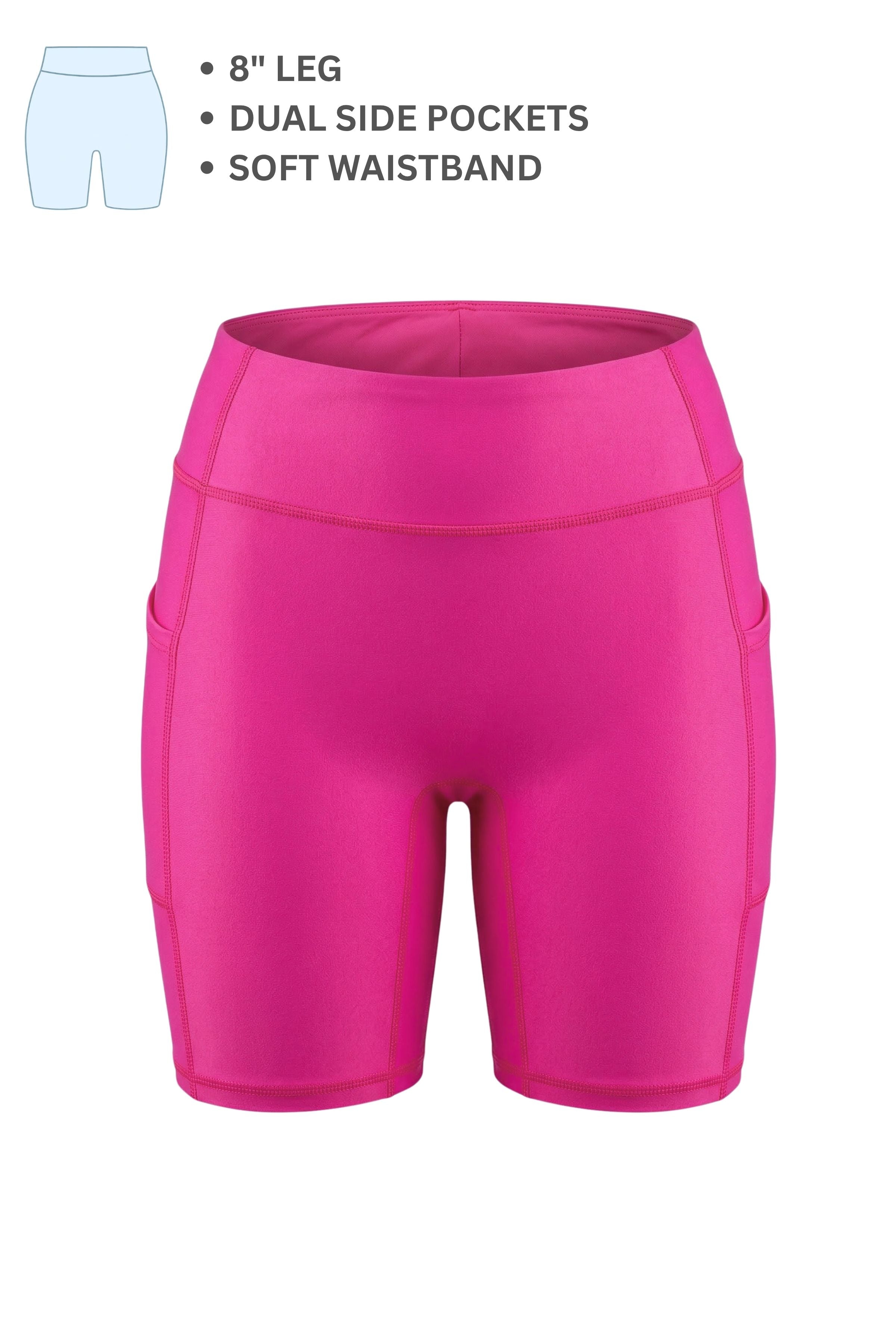 Pink athletic shorts with features listed on a white background