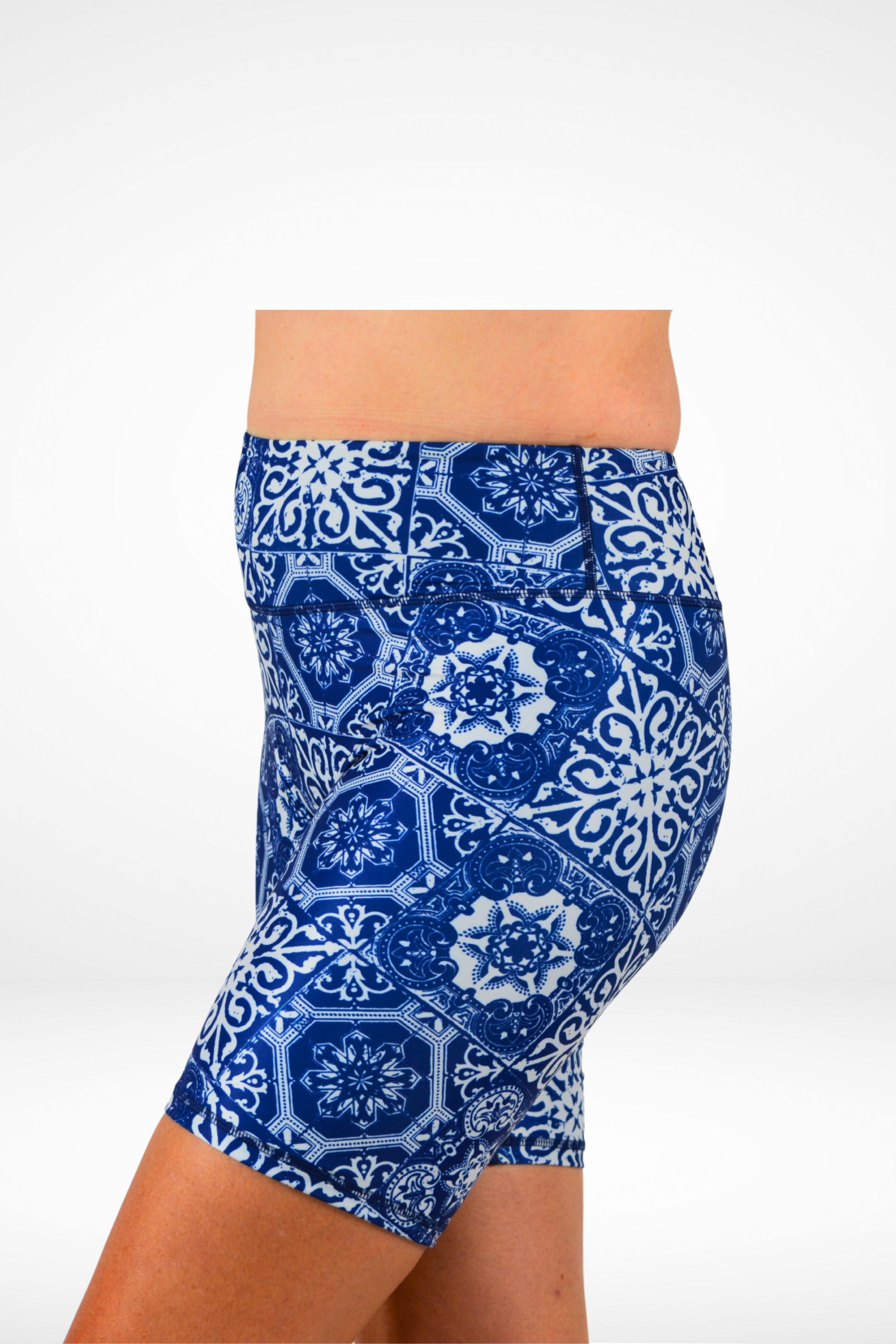 Blue patterned shorts on a white background