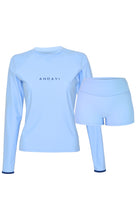Light blue long-sleeve top and shorts set with 'ANDAVI' branding on a white background