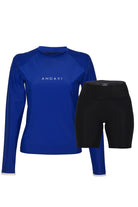 Blue long-sleeve rash guard and black shorts with 'ANDAVI' branding on a white background