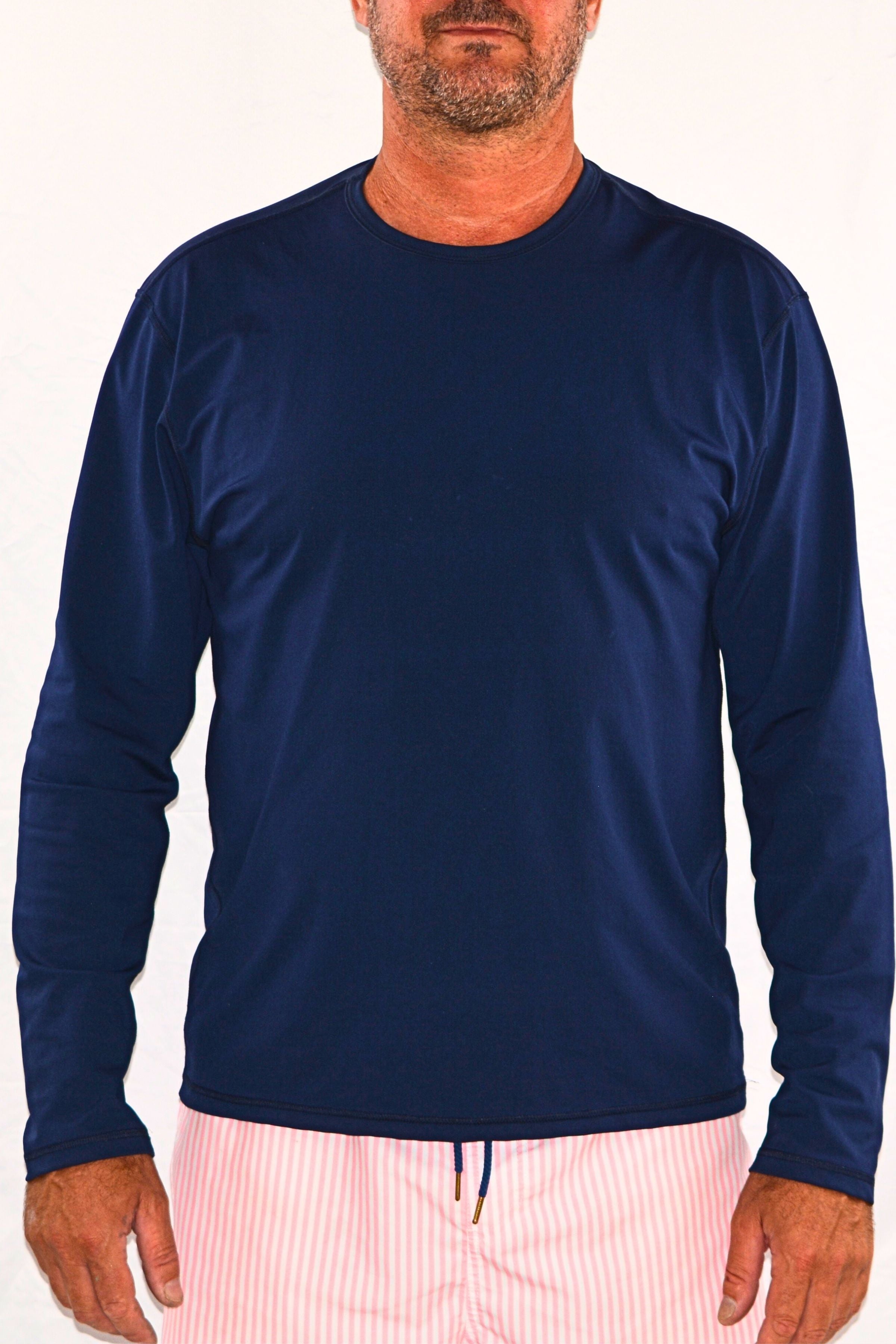 man wearing long sleeve rash guard in navy blue andavi swim australia