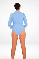 women weaing andavi swim light blue long sleeve rash guard and light blue moderate coverage bikini bottom