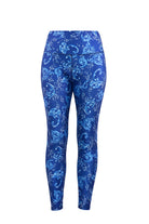 Blue patterned swim leggings on a white background