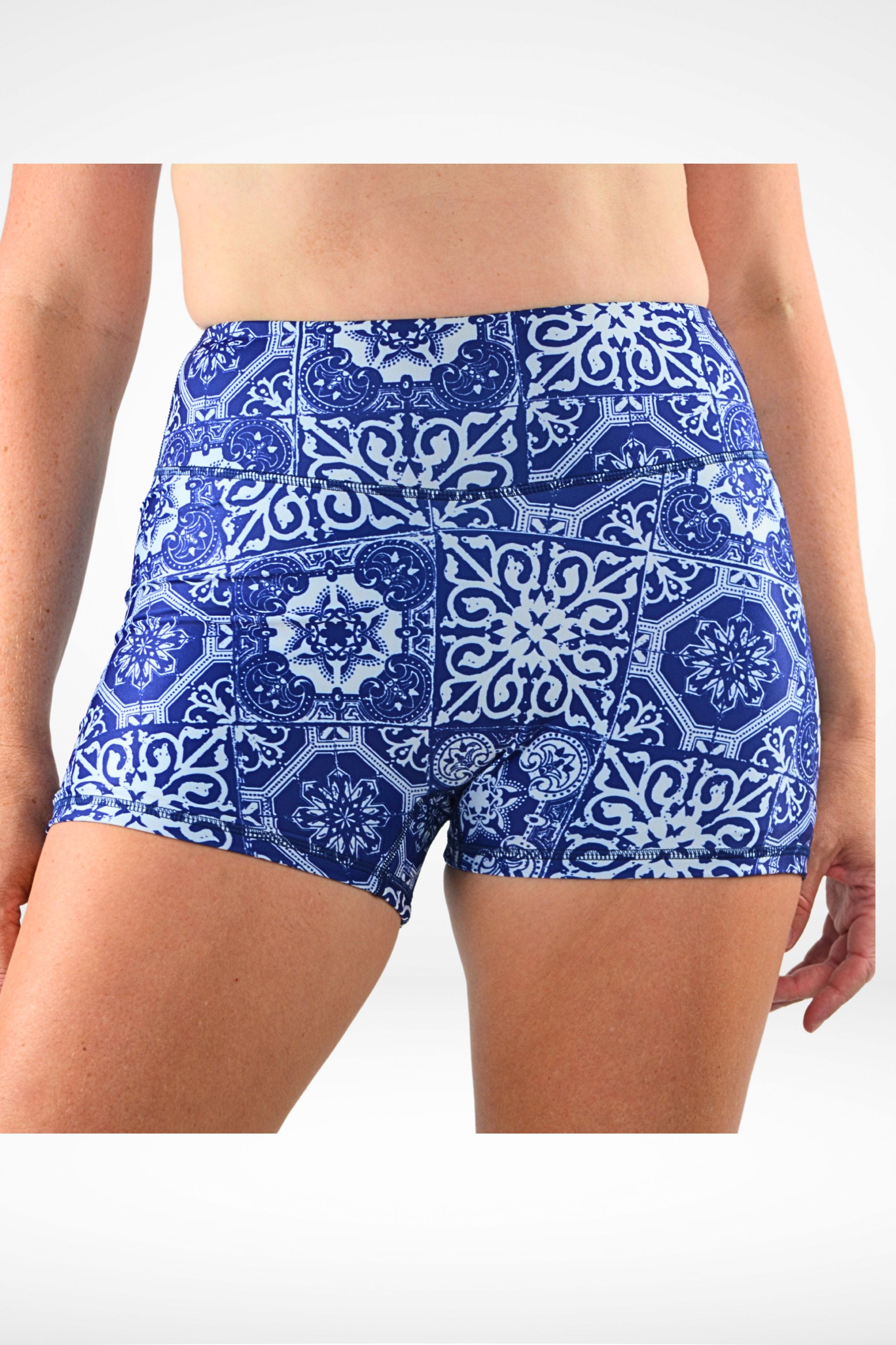 model wearing geometric white blue print andavi swim shorties 