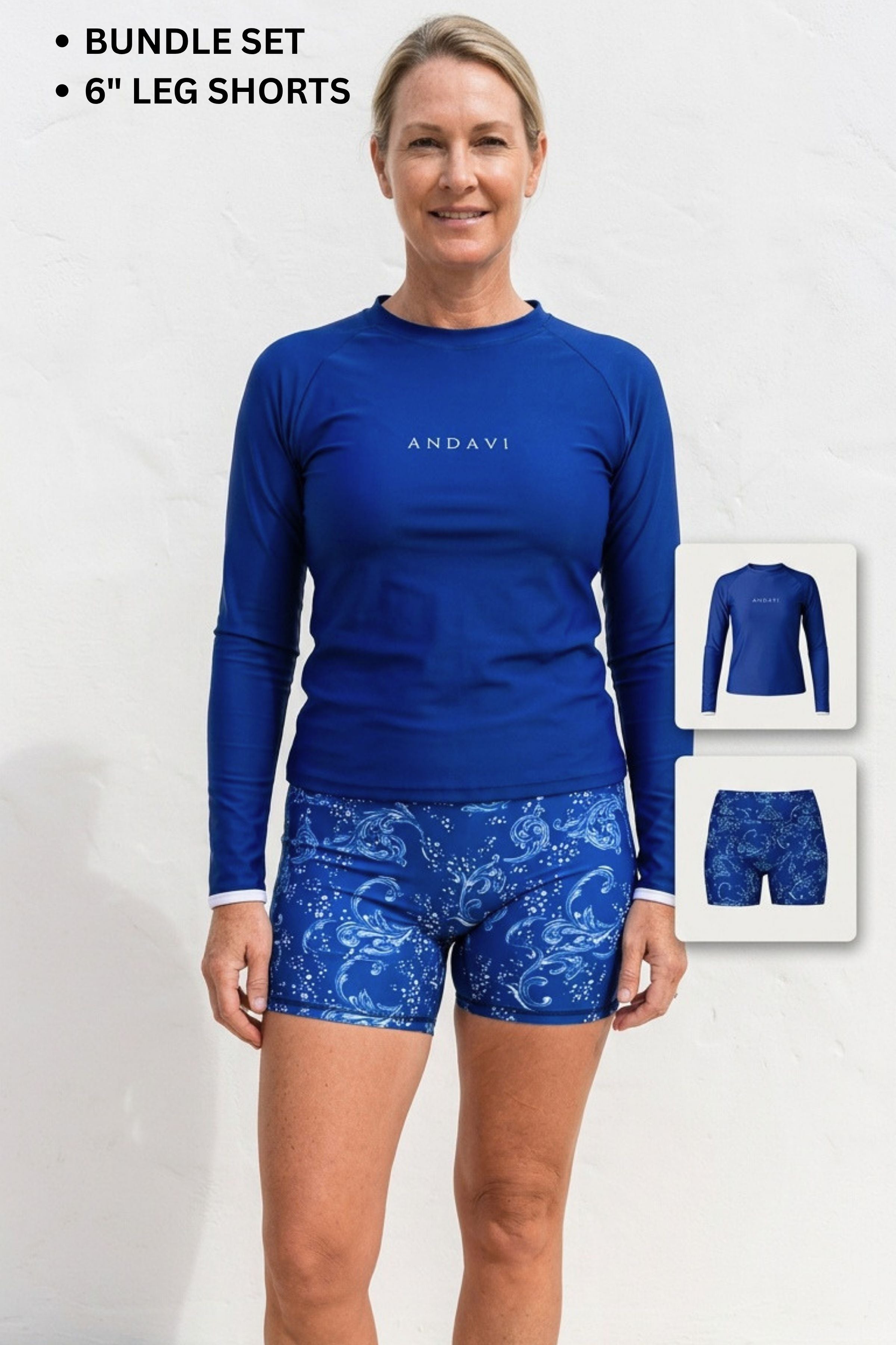 Woman wearing a blue long-sleeve top and patterned shorts with Andavi branding, on a white background.