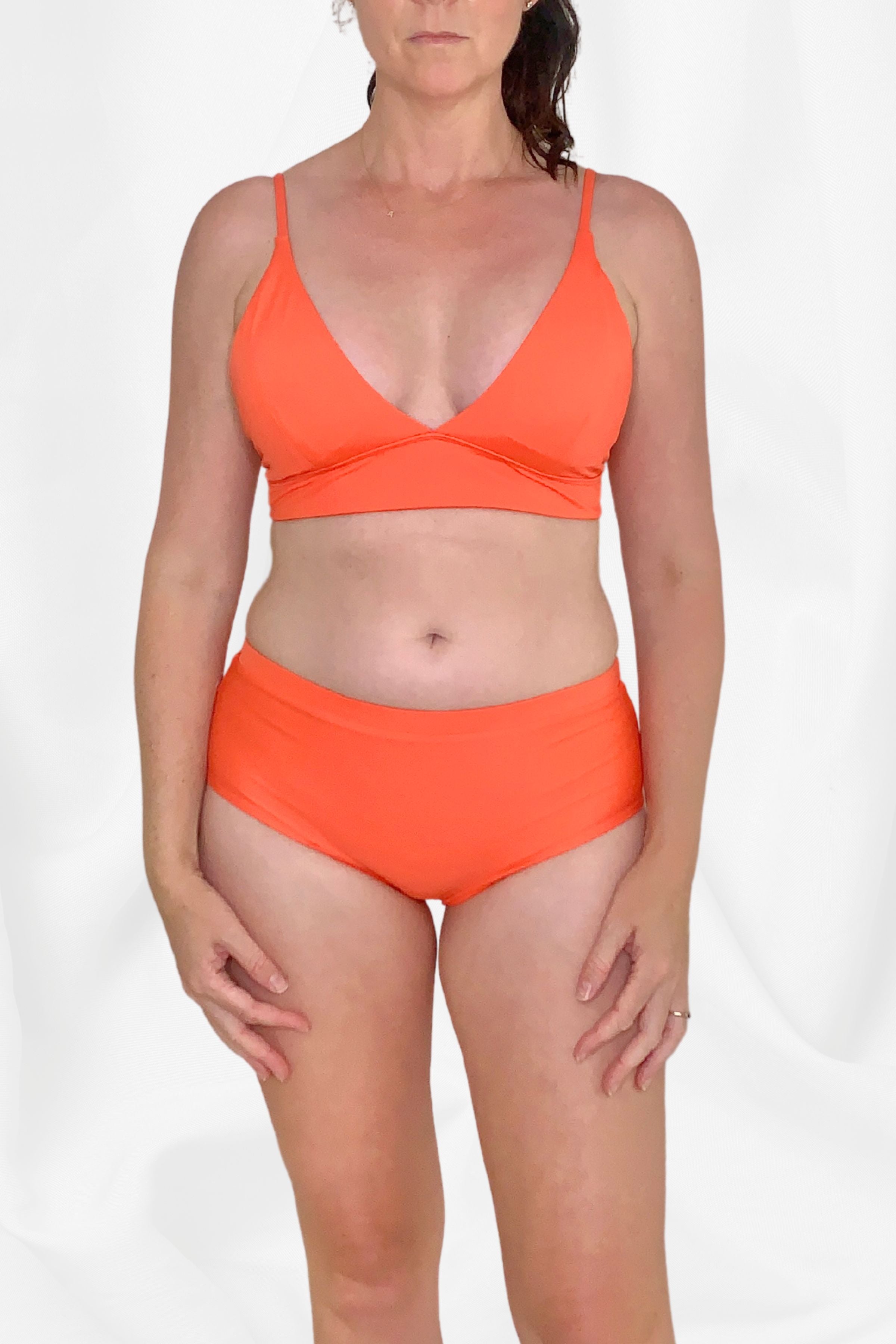 women wearing coral bikini