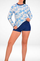 women wearing white blue print sun shirt