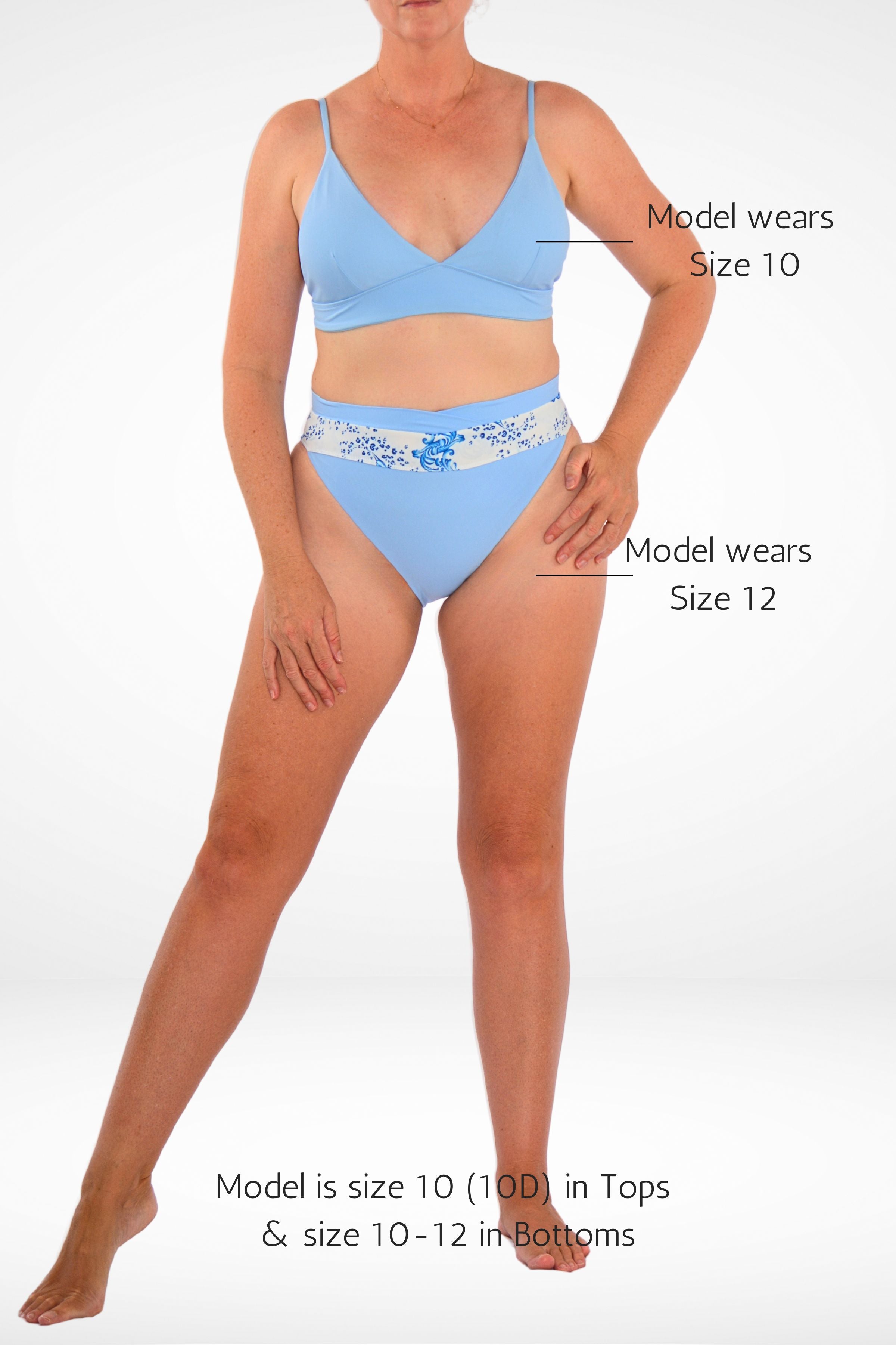 women wearing light blue high-rise bikini set with size guide description