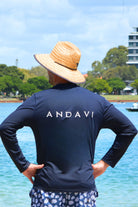 man wearing andavi long sleeve navy blue rash guard