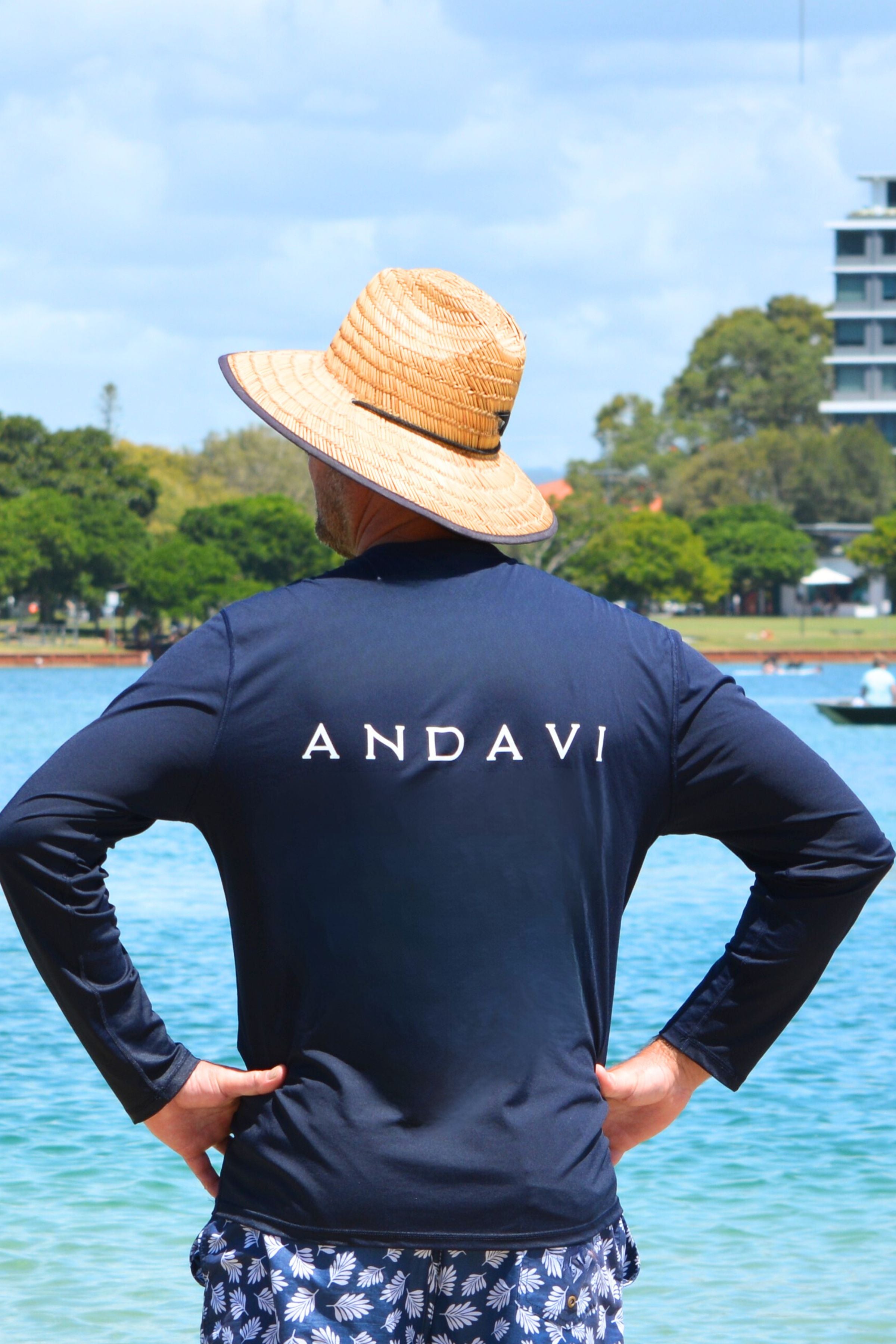 man wearing andavi long sleeve navy blue rash guard