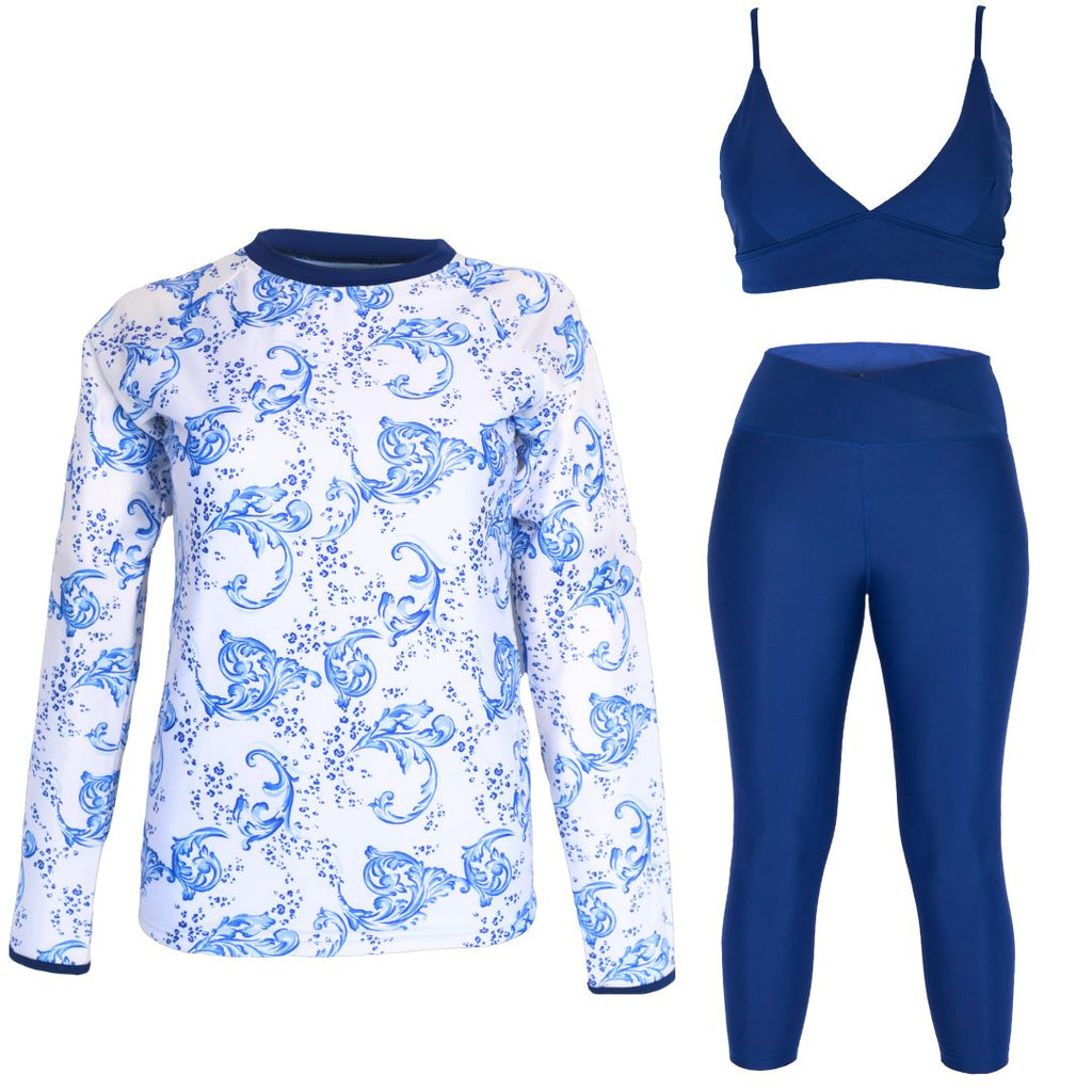 white and blue rash guard with navy blue leggings