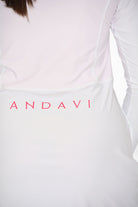 model wearing andavi white pink swim active sun protections upf50+ dress cover up with front zip and high neck collar