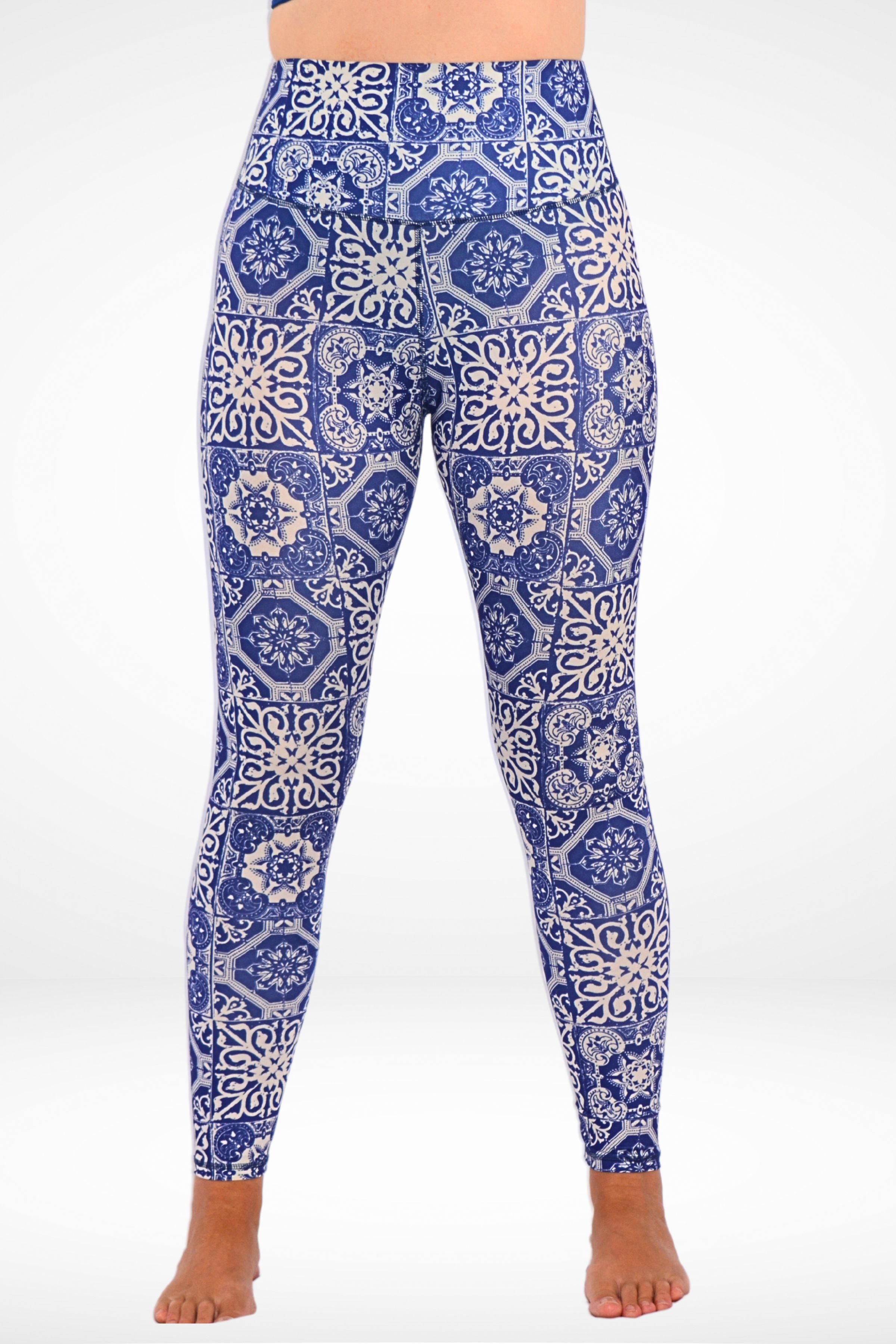 women wearing white and blue andavi swim leggings upf50+