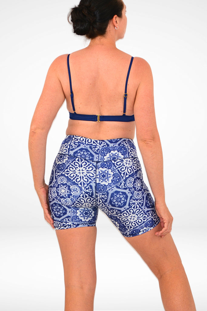 model wearing geomtric print andavi compression swim active shorts 