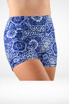 model wearing geometric white blue print andavi swim shorties 