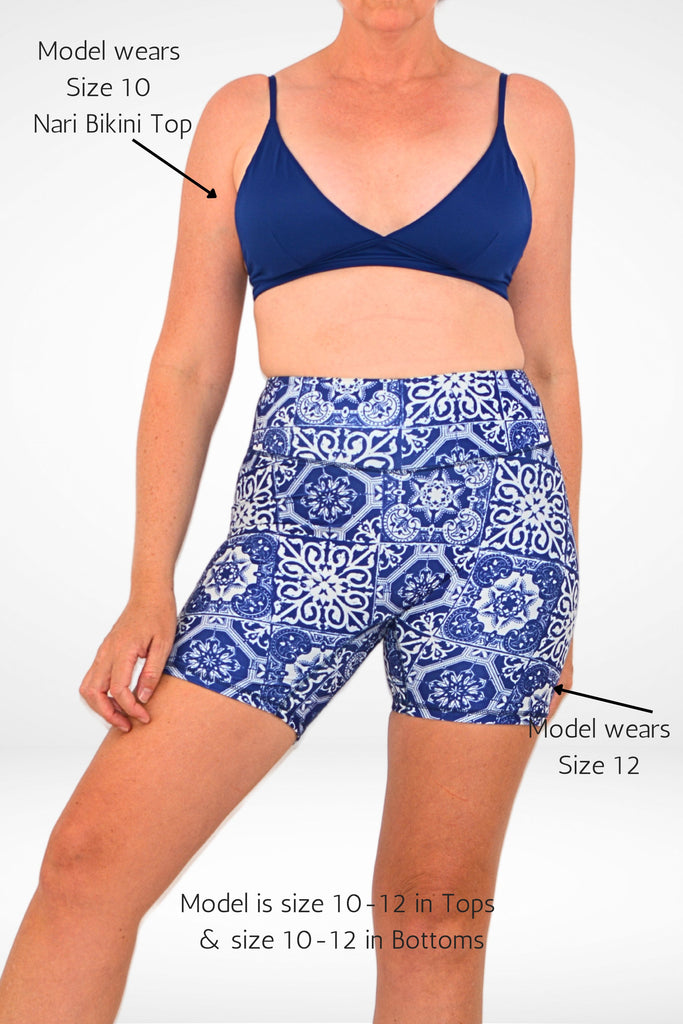 model wearing andavi compression geometric swim shorts 