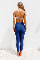 women-blue-leggings blue back view